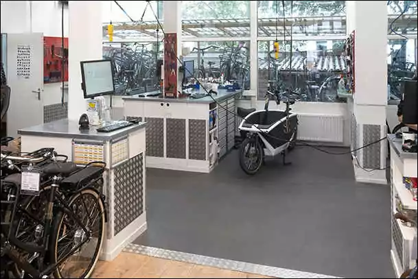 black bikes bike repair near olympic stadium