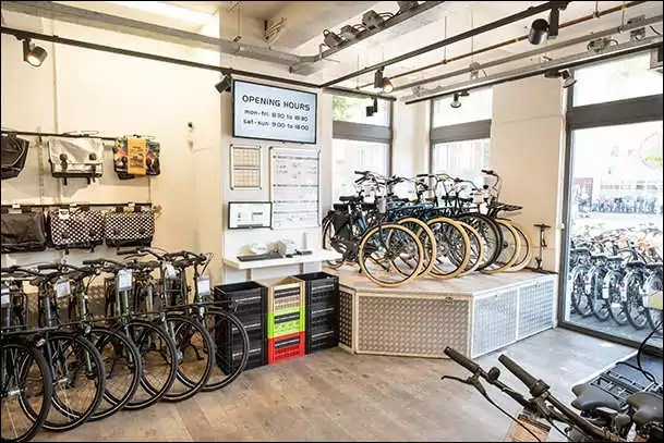 black bikes haarlem inside the rental shop