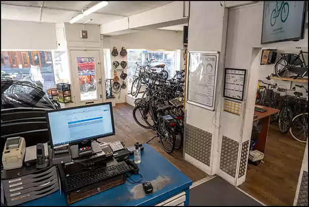 black bikes inside rental shop rai