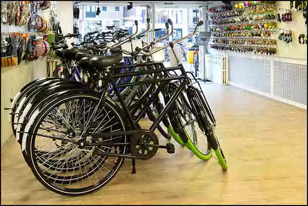 black bikes shop amsterdam city