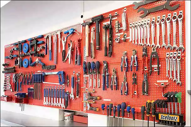 black bikes tools wall in the rental shop