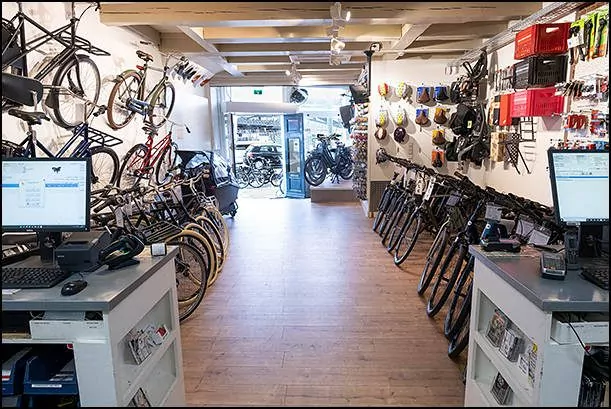 black bikes rental shop amsterdam central station