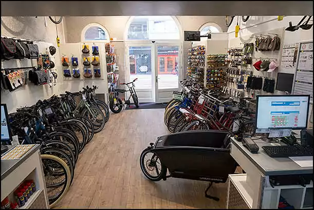 black bikes inside the shop de pijp