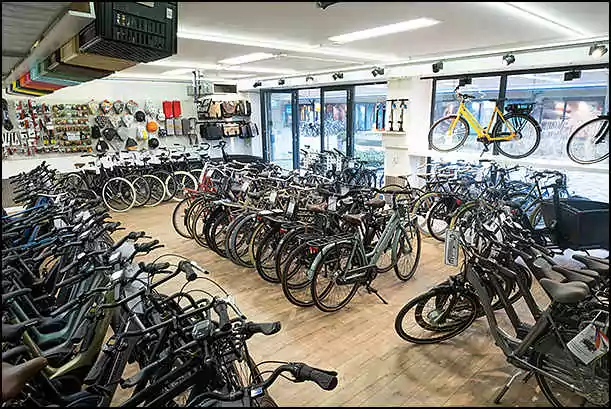 black bikes diemen inside the rental shop