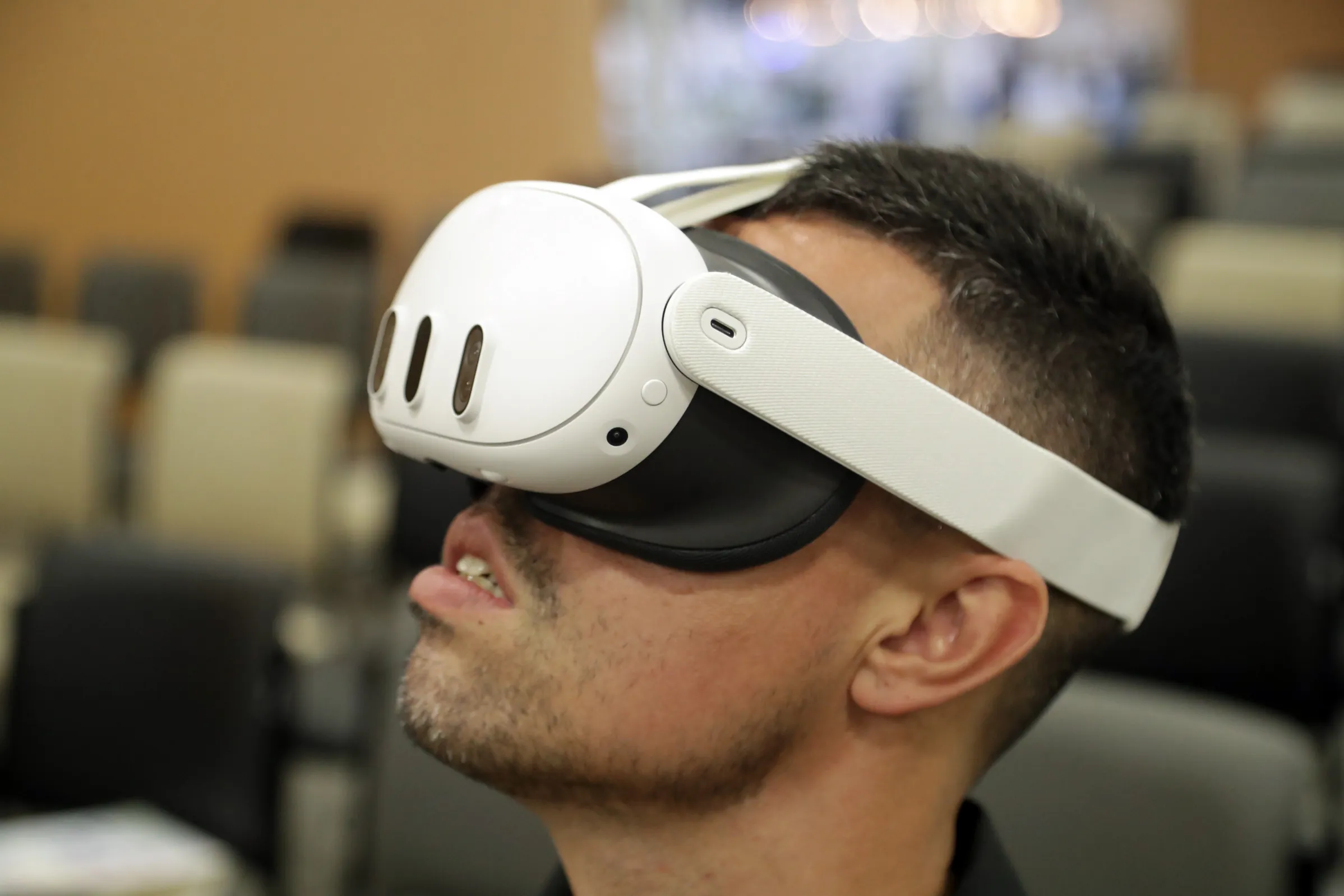 Person wearing a VR headset during a virtual reality gaming experience